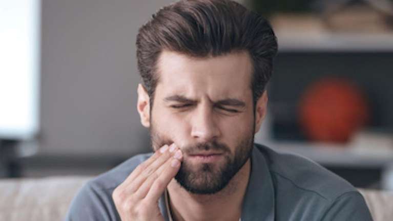 A man with a toothache