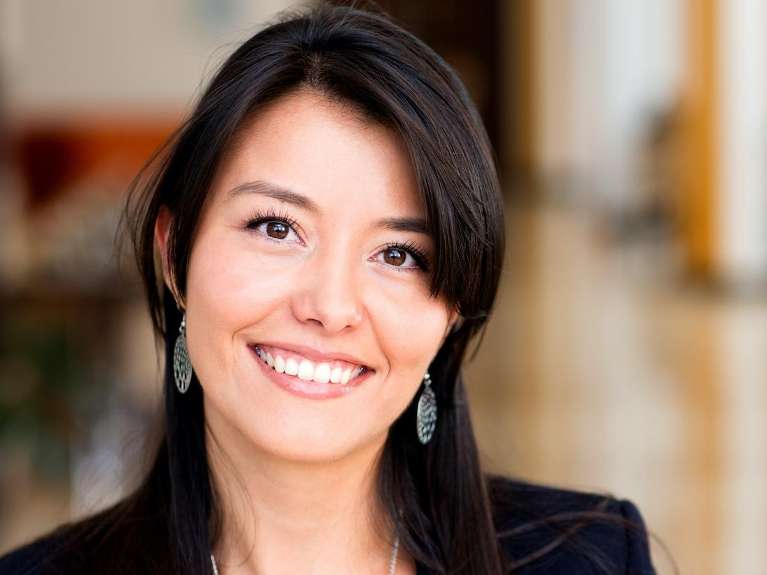 A smiling professional woman