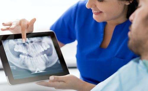 A patient viewing his digital dental x-rays